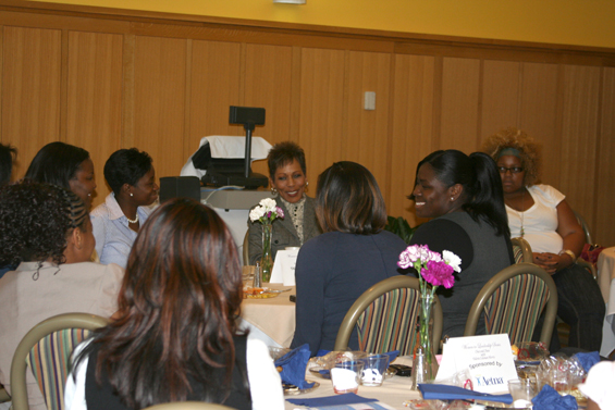 Valerie Morris (center) speaks to students attending the Women In Leadership Seminar