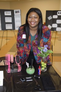 Student Trejha Whitfield exhibits her hair styling business at the 2015 Entrepreneurship Expo.