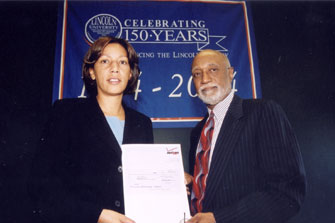President Ivory V. Nelson, Ph.D. (right)  and Andrea L. Custis, president and COO of Verizon 