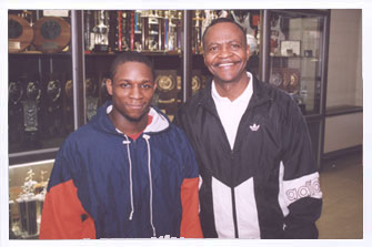 Lincoln University Track Coach and Athletic Director Cyrus Jones (right) and sprinter Chazz Clemons have brought more national attention to the Lions' track and field program.
